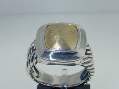 David Yurman Silver 18K Yellow Gold Diamond Ring: This is David Yurman Silver 18K Yellow Gold Ring.Size of ring is 7.Ring Weight : 6.8 grams.The measurements of the ring face are 15 x 15 mm.There is Stemp "925" "750"on it.