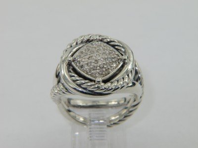 David Yurman Silver & Diamond Ring: David Yurman Silver & Diamond Ring The total ring's weight is 11 grams. The total weight of diamond is 0.80 cts. approximately, I color SI clarity. The Ring Face is 16 x 15 mm. The size of the ring is