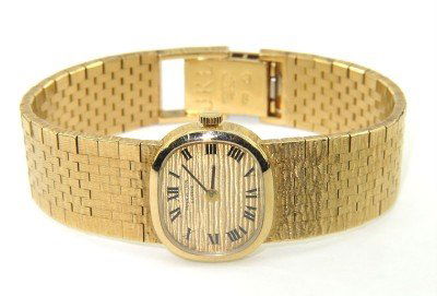 Patek Philippe 18K Yellow Gold Wrist Watch: Patek Philippe 18K Yellow Gold Wrist Watch With Extra Links The total watch's weight is 52.4 grams. The measurements of watch head is 16 x 19 mm and 4 mm thick. The length of watch: 6" swiss made Wate
