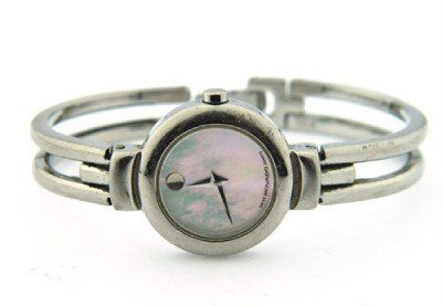 Movado Stainless Steel Bangle Watch.: Movado Stainless Steel Bangle Watch. The total watch's weight is 30.8 grams.The size of the watch head is 22 x 22 mm and 4 mm thick.The measurements of inside watch: 49 x 51 mm.Swiss Made.Water Resist