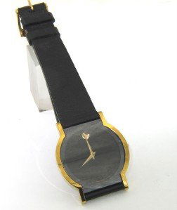 Movado Stainless Steel Leather Strap Watch: Movado Stainless Steel Leather Strap Watch. The total watch's weight is 26 grams. The measurements of the watch head is 29 x 32 mm and 3 mm in thick. The length of watch: 9". Swiss Made. Water Resista