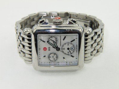 Michelle Stainless Steel Chronograph Watch: Michelle Stainless Steel Chronograph Watch With Extra Link. The total watch's weight is 124 grams. The size of watch head: 32 x 33 mm and 9 mm thick. The length of the watch is 6.75". Swiss Made. Wate