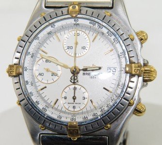 Breitling Automatic Chronograph 2 Toned Mens Wrist: Breitling Automatic Chronograph Mens Two-Toned ( Stainless Steel/ Gold) Wristwatch.The total watch's weight is 152.6 grams.The measurements of watch head is 40 x 43 mm and 15 mm thick.The length of wa