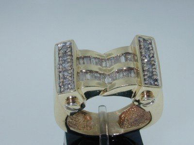 14K Yellow Gold Men's Diamond Ring.: 14K Yellow Gold Men's Diamond Ring.The total ring's weight is 16.6 grams.The total diamond weight is 0.5 cts,approxmiately. I color, SI clarity.The dimensions of the ring's face is 23 x 18 mm and thic