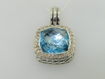 David Yurman Silver Blue Topaz & Diamond Pendant: David Yurman Silver Blue Topaz & Diamond Pendant.The total Pendant's weight is 10.8 grams.The total weight of diamonds is 0.72 cts. approximately I and SI clarity.The size of the blue topaz is 14 x 14