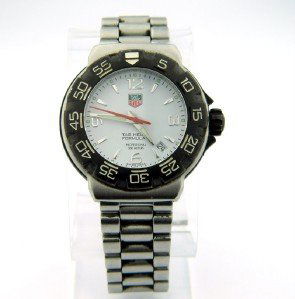 Tag Heuer DateJust Stainless Steel Professional Watch: Tag Heuer DateJust Stainless Steel Professional Watch. The total watch's weight is 146.1 grams.The size of watch head: 37 x 40 mm and 8 mm thick.The length of the watch is 8.5".Swiss Made.Water Resist