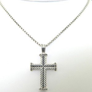 David Yurman Silver Onyx Cross Necklace: David Yurman Silver Onyx Cross Necklace.The total weight of Necklace is 11.2 grams.The total weight of onyx: 0.24 cts.The size of the pendant is 34 x 20 mm, Thickness is 1 mm.The size of the necklace 