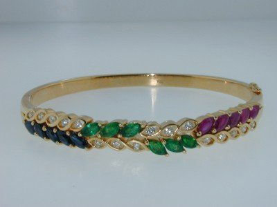 18K Yellow Gold,Emerald,Ruby,Sapphire & Diamond Ba: 18K Yellow Gold, Emerald, Ruby, Sapphire & Diamond Bangle The total bangle's weight is 28.3 grams. There are 6 Emerald, 5 Sapphire, 5 Ruby on it. Marquise shape, size are approximately 4.5 x 3 mm , ea