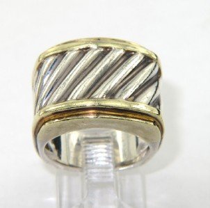David Yurman Silver/14K Yellow Gold Ring: David Yurman Silver /14K Yellow Gold Ring.The total ring's weight is 8.7 grams.The Ring Face is 18 x 13 mm, 10 mm wide.The size of the ring is 4