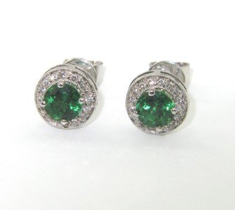 18K White Gold Tsavorite Diamond Earrings: 18K White Gold Tsavorite Diamond Earrings.The total weight of earring is 3 grams.There are 2 tsavorite in earring each has 4 x 4 mm in size.Total Diamonds weight are approximately 0.4 cts, I color, SI