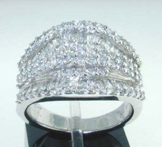 14k White Gold Diamond Ring: 14K White Gold Diamond Ring. The total ring's weight is 10.4 grams. The total weight of diamond is 2 ct. approximately and I color VS clarity. The size of the ring on the surface is 15 mm in diameter.