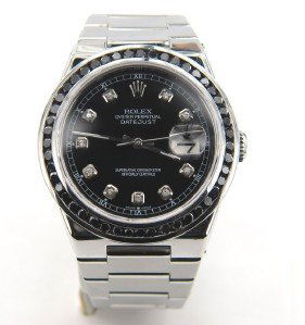 Rolex Oyster Perpetual Datejust Mens Watch: Rolex Black Diamond & Diamond Stainless Steel Oyster Perpetual Datejust Mens Watch. The total watch's weight is 122.3 grams. The total weight of Black Diamond: 2 cts. Total weight of diamond: 0.3 cts.
