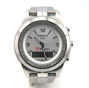Tissot T-Touch Classic Stainless Steel Watch: Tissot T-Touch Classic Stainless Steel Watch The total watch's weight is 134.6 grams. The measurement of the watch head is 38 x 40 mm and 12 mm thick. Complications: Alarm Altimeter, Barometer, Compas