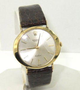 Rolex 18K Gold Cellini Leather Strap Mens Watch: Rolex 18K Yellow Gold Cellini Leather Strap Mens Watch.The total watch's weight is 29.3 grams.The size of watch head: 29 x 34 mm and 6 mm thick.The length of the watch is 7.75".Leather Strap is 18 mm