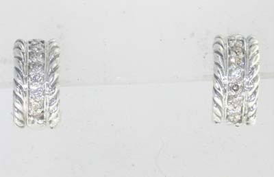 David Yurman silver, Diamond Earrings: David Yurman silver, Diamond Earrings.Earring's weight : 3.6 grams.The weight of Diamond: 0.32cts. I color, SI clarity.The measurements of the earrings is 11 x 5 mm