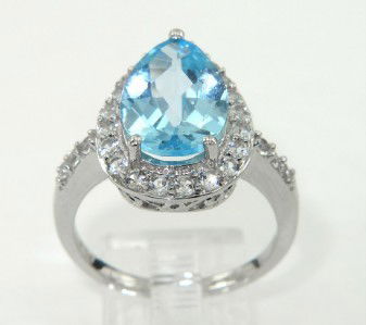 10K White Gold Blue Topaz & White Sapphire Ring: 10K White Gold Blue Topaz & White Sapphire Ring.The total ring's weight is 4.8 grams.The size of blue topaz: 12 x 8 mm.The total weight of white Sapphire: 0.9 cts. approximately.The size of the ring o