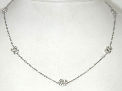 Roberto Coin 18K White Gold Diamond Necklace.: Roberto Coin 18K White Gold Diamond Necklace. The total weight of Necklace is 6.2 grams. The total weight of diamond is 0.5 cts. approximately, I color SI clarity. The Necklace is 16" long.