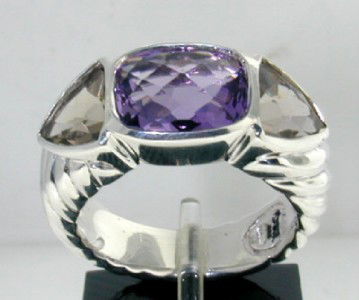 David Yurman Silver, Smoky Topaz & Amethyst Ring: David Yurman Silver, Smoky Topaz & Amethyst Ring The total ring's weight is 7.4 grams. The size of Amethyst 10 x 8 mm. The size of Smoky Topaz 7 x 7 mm . The size of the ring is 6.5