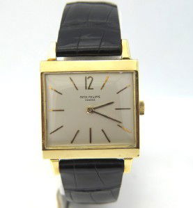 Patek Philippe 18K Yellow Gold Leather Strap Watc: Patek Philippe 18K Yellow Gold Leather Strap Watch.The total watch's weight is 35.9 grams.The measurements of watch head is 27 x 28 mm and 6 mm thick.Movement Details: Meachanical Hand wond.The length