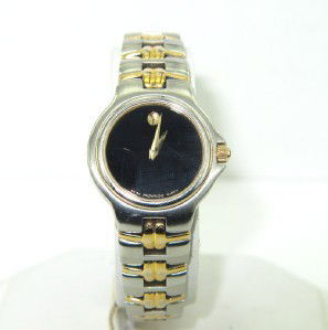 Movado 2-Tone Stainless Steel Quartz Watch.: Movado 2-Tone Stainless Steel Quartz Watch.The total watch's weight is 54.4 grams.The measurements of the watch head is 21 x 25 mm and 3 mm thick.The length of watch: 7.25".Swiss Made.Water Resistant.