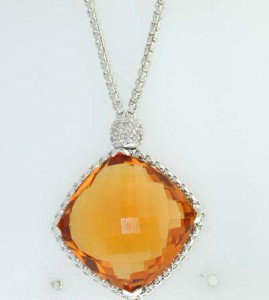 David Yurman Silver Citrine Diamond Necklace.: David Yurman Silver Citrine Diamond Necklace. The total weight of Necklace is 14.2 grams. The size of the Citrine is 25 mm in diameter. Total weight of diamond are 0.3 cts, approximately, I color, SI1