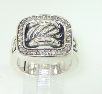 David Yurman Silver & Diamond Ring: David Yurman Silver & Diamond Ring.The total ring's weight is 10.6 grams.The total weight of diamond is 51 pts. approximately, I color SI clarity.The Ring Face is 17 x 15 mm.The size of the ring is 6