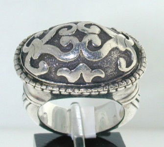 John Hardy Silver Ring: John Hardy Silver Ring. The total ring's weight is 17.8 grams. The measurement of the ring: 25 x 15 mm. and 12 mm thick. The size of the ring is 6".