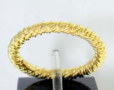 Tiffany & Co 18k Yellow Gold Ring.: Tiffany & Co 18k Yellow gold Ring.The total ring's weight is 3.5 grams.The size of the ring is 6 and 2 mm in thickness