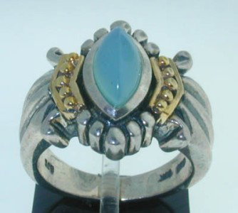 BJC Silver 14k Gold Chalcedony Ring: BJC Silver & 14K Yellow Gold Chalcedony Ring. The total ring' weight is 8.7 grams. The size of chalcedony is 10x5 mm. The measurements of the Ring are 18x16 mm. and thickness is 10 mm. The size of the