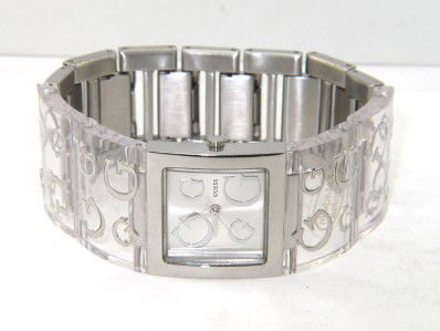 Guess Stainless Steel Clear Strap Watch: Guess Stainless Steel, Clear Strap Watch.The total watch's weight is 75.1 grams.The measurements of the watch head is 26 x 27 mm and 9 mm in thick.The length of watch: 8.25".Chain is 26 mm wide.Water