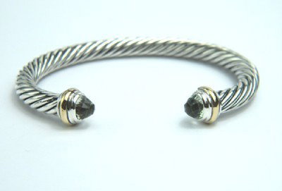 David Yurman Silver,14K Gold, Prasiolite Bangle. : David Yurman Silver, 14K Yellow Gold, Prasiolite Bangle. The total Bangle's weight is 39.8 grams. The size of Prasiolite: 6 mm The measurement of the inside bangle is 48 x 60 mm, Thickness: 6 mm.