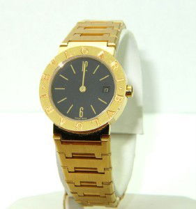 Bvlgari 18K Yellow Gold JustDate Watch: Bvlgari 18K Yellow Gold JustDate Watch The total watch's weight is 103.4 grams. The measurements of watch head is 24 x 24 mm and 5 mm thick. The length of watch: 6.75" swiss made Water Resistant Chain