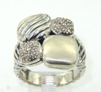 David Yurman Silver Diamond Ring: David Yurman Silver Diamond Ring.The total ring's weight is 14.1 grams.The total diamond weight : 0.20 ct. I color, SI clarity.The measurement of ring surface: 20 x 18 mm , 6 mm thickness.The size of 