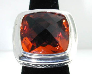 David Yurman Silver Citrine Ring.: David Yurman Silver Citrine Ring.The total ring's weight is 26.7 grams.The size of the Citrine is 20 x 20 mm.The size of the ring is 7.25.The measurement of the face of the ring is 25 x 25 mm. Thickne