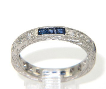 Platinum Diamond & Sapphire Ring: Platinum Diamond & Sapphire Ring.The total ring's weight is 5.3 grams.The total weight of diamond: 0.24 ct. approximately, H color, VS clarity.The total weight of sapphire: 0.48 cts.The ring is 2 mm w