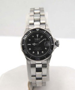 Invicta Professional Stainless Steel DateJust Watch: Invicta Professional Stainless Steel DateJust Ladies Watch.The total watch's weight is 58.2 grams.The measurements of the watch head is 23 mm in diameter and 8 mm in thick.The length of watch: 7".Chai