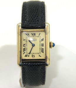 Cartier Silver Black Leather Strap watch: Cartier Silver Black Leather Strap Watch The total watch's weight is 22 grams. The measurement of watch head is 18 x 19 mm and 5 mm thick. Circular-grained crown set with a spinel cabochon The length 
