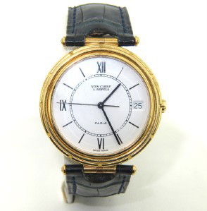 Van Cleef & Arpels 18K Yellow Gold, Leather Strap W: Van Cleef & Arpels 18K Yellow Gold Leather Strap Watch.Watch's Weight: 44 grams.The measurement of watch head: 32 x 32 mm and 4 mm in thickness.The length of watch: 8.5 ".Water resistant.Swiss made