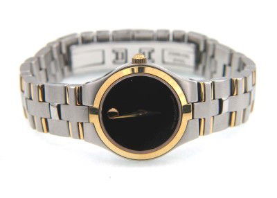 Movado Stainless Steel & Gold Plated Watch: Movado Stainless Steel & Gold Plated Watch.The total watch's weight is 56.6 grams.The measurements of the watch head is 18 x 23 mm and 4 mm thick.The length of watch: 6.5".Swiss Made.Water Resistant.C