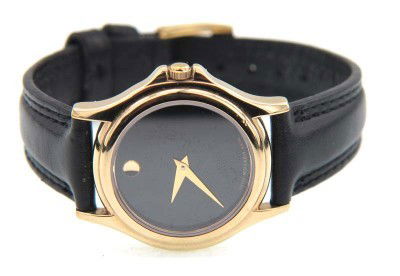 Movado Yellow Gold Plated Leather Strap Watch: Movado Yellow Gold Plated Leather Strap Watch.The total watch's weight is 22.9 grams.The measurements of the watch head is 24 x 27 mm and 4 mm in thick.The length of watch: 8".Swiss Made.Water Resista