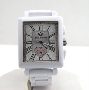 Juicy Couture Stainless Steel Jelly Strap Watch: Juicy Couture Stainless Steel Jelly Strap Watch.The total watch's weight is 67.4 grams.The measurements of the watch head is 38 mm in diameter and 10 mm in thick.Strap is 17 mm wide.The length of watc