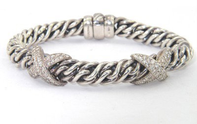 David Yurman Silver Diamond Bracelet: David Yurman Silver Diamond Bracelet.The bracelet weight is 57 grams.The total weigth of diamond: 2.46 cts. H color, VS clarity.The measurements of bracelet: 7.25" long.The size of bracelet: 7 mm wide
