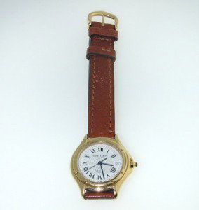 Cartier 18K Yellow Gold, Leather Strap Watch.: Cartier 18K Yellow Gold, Leather Strap Watch.Watch's Weight : 30 grams.The measurements of watch head: 25 x 26 mm.The length of watch: 6".Swiss Made