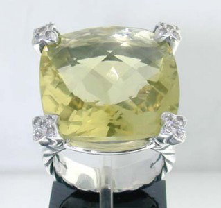 David Yurman Silver, Lemon Citrine & Diamond Ring.: David Yurman Silver, Lemon Citrine & Diamond Ring.The total ring's weight is 9.5 grams.The total weight of the diamond is 0.25 cts approximately, H color VS clarity.The size of the Lemon Citrine is 14