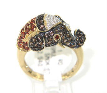 14K Yellow Gold Garnet, Diamond & Smoky Topaz Ring: 14K Yellow Gold Garnet,Diamond & Smoky Topaz Ring The total ring's weight is 6.4 grams. The total diamond weight is 0.2 cts,approxmiately. I color, SI clarity. The weight of garnet is 0.57 cts, approx