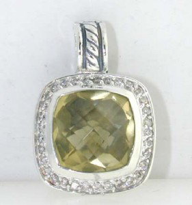 David Yurman Silver, Lemon Citrine & Diamond Penda: David Yurman Silver, Lemon Citrine & Diamond Pendant.The total Pendant's weight is 6.1 grams.The total weight of diamonds is 40 Pts. approximately I and SI clarity.The size of the Lemon Citrine is 10