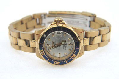 Invicta Professional Stainless Steel DateJust: Invicta Professional Stainless Steel DateJust Ladies Watch.The total watch's weight is 53.3 grams.The measurements of the watch head is 23 mm in diameter and 8 mm in thick.The length of watch: 6".Chai