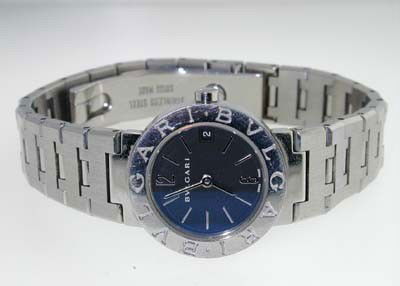 Bvlgari Stainless Steel Watch: Bvlgari Stainless Steel Watch.The total watch's weight is 49 grams.The measurements of watch head is 22 x 22 mm and 5 mm thick.The length of watch: 5.25".swiss made.Chain is 11 mm wide