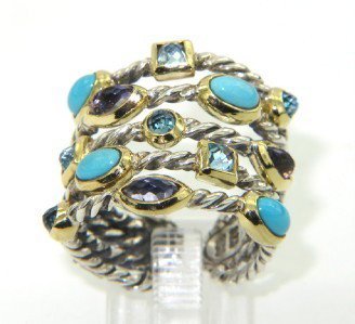 David Yurman 18K Gold/Silver Turquoise Ring: David Yurman 18K Yellow Gold/Silver Turquoise And Colored Stone Ring.The total ring's weight is 8.4 grams.The size of the turquoise is 3 x 2 mm.The total weight of colored stone: 0.7 cts.There is D.Y,