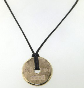 Gucci 18K Yellow Gold Necklace With Leather C: Gucci 18K Yellow Gold Necklace With Leather Chain. The total weight of Necklace is 11.4 grams. The measurements of pendant: 19 x 19 mm. The necklace is 19" long.